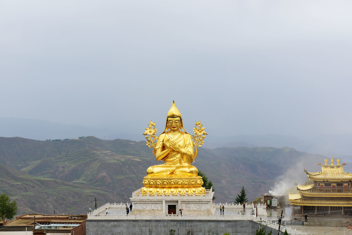 Bronze statue of Master Tsongkhapa at Xiaqiong Temple in Tibet