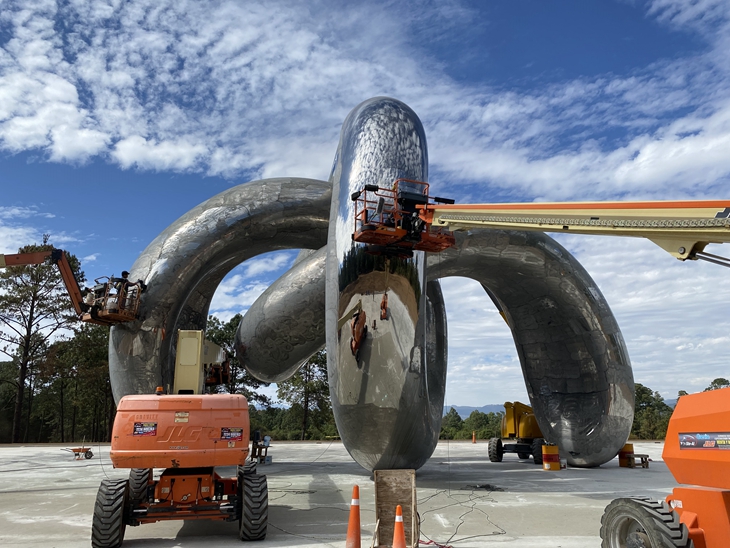 Site Installation of the Large Mirror Polished Steel Crab Monument